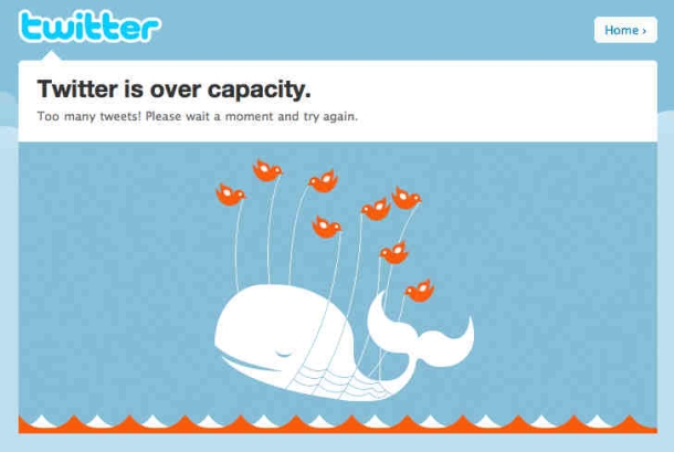 Error message: Twitter is over capacity. Too many tweets! Please wait a moment and try again. Image shows a whale being lifted out of the waves by small birds.