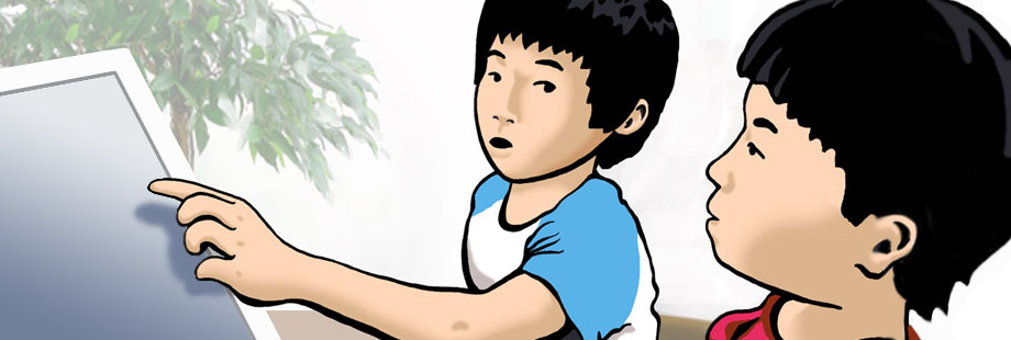 Two children work at a computer