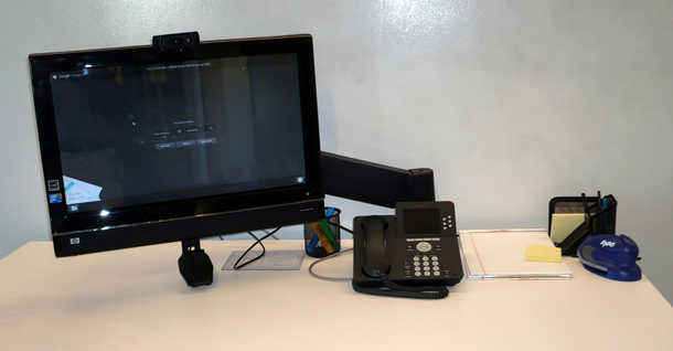 Computer and phone on a desk