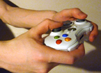 Hands holding game controller