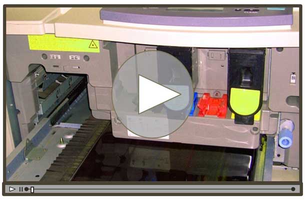 Opening screen of a printer repair video showing the inside of the device