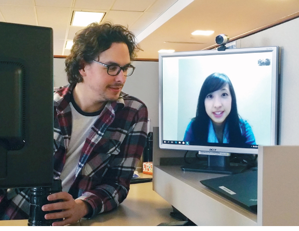 Two designers connect over screen sharing software.